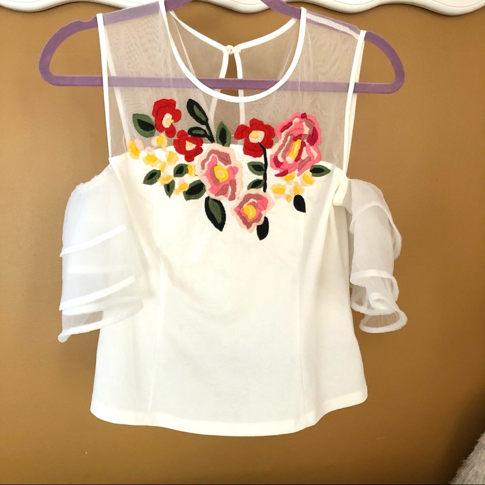 Embroidered cold shoulder ruffled top small